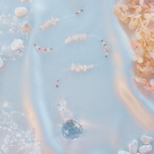 Keskmine päikesepüüdja roosa kvartsi kivikestega