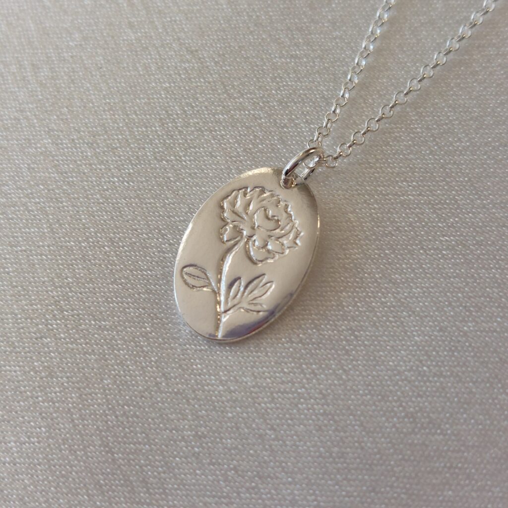 Sünnikuu lill, november, pojeng, ripats, kaelakee